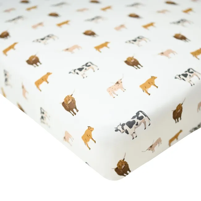 Kyte Baby Printed Crib Sheet in Moo